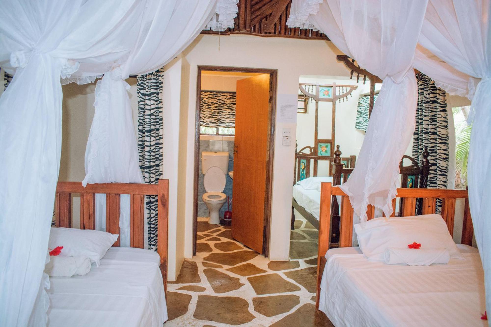 דיאני ביץ' Kijani Cottages In Diani מראה חיצוני תמונה