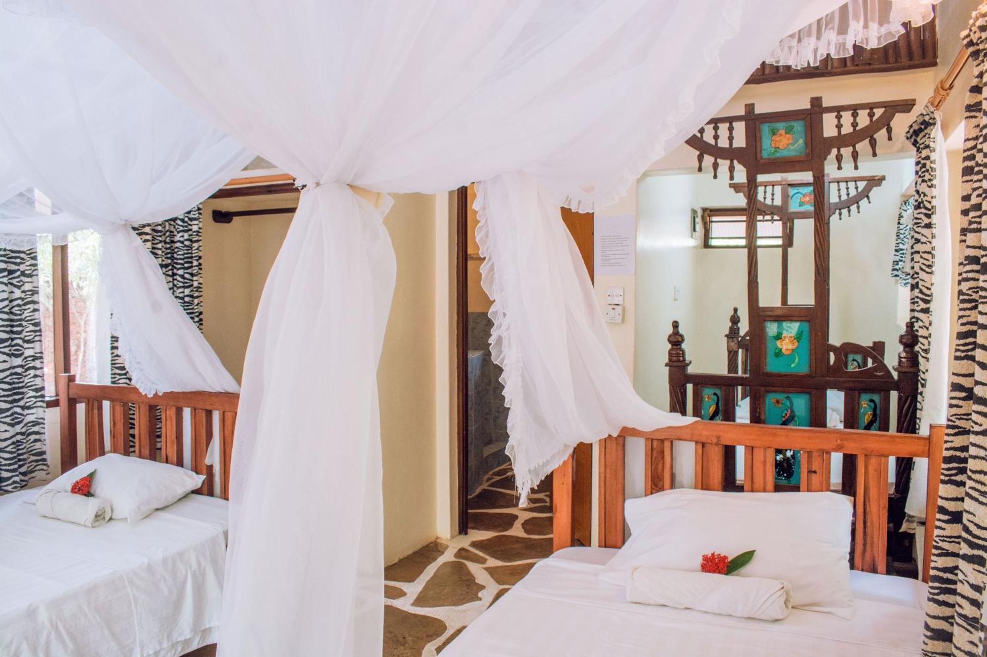 דיאני ביץ' Kijani Cottages In Diani מראה חיצוני תמונה
