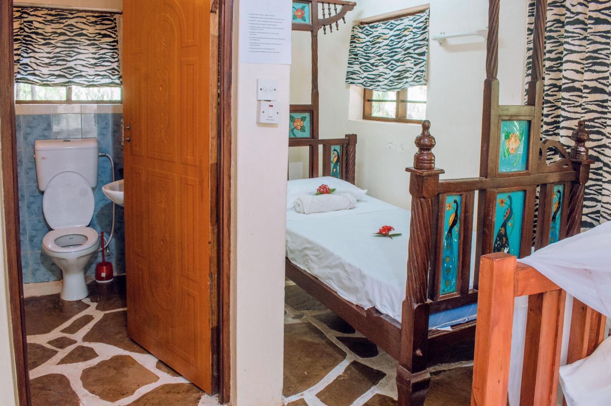 דיאני ביץ' Kijani Cottages In Diani מראה חיצוני תמונה