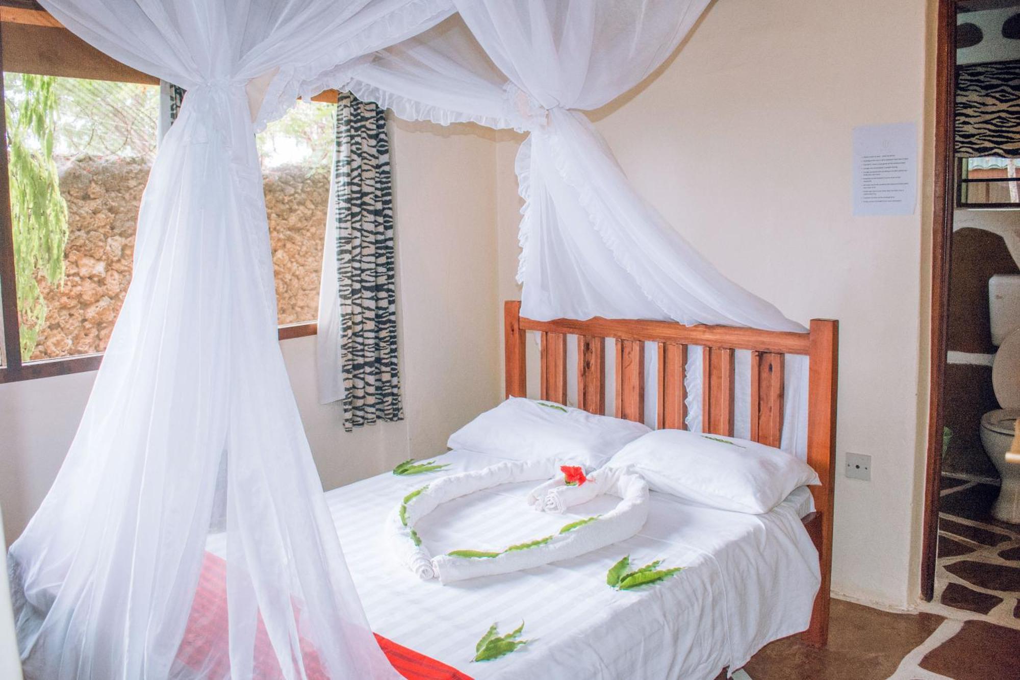 דיאני ביץ' Kijani Cottages In Diani מראה חיצוני תמונה