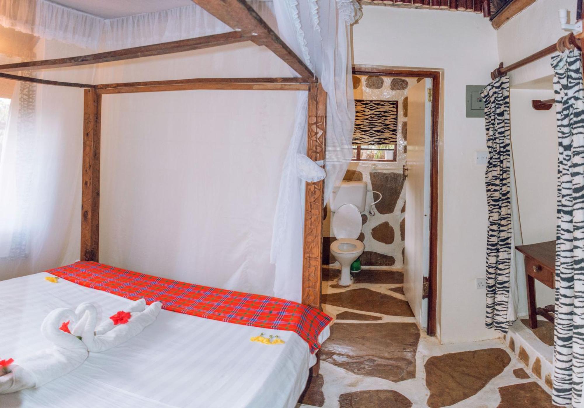 דיאני ביץ' Kijani Cottages In Diani מראה חיצוני תמונה