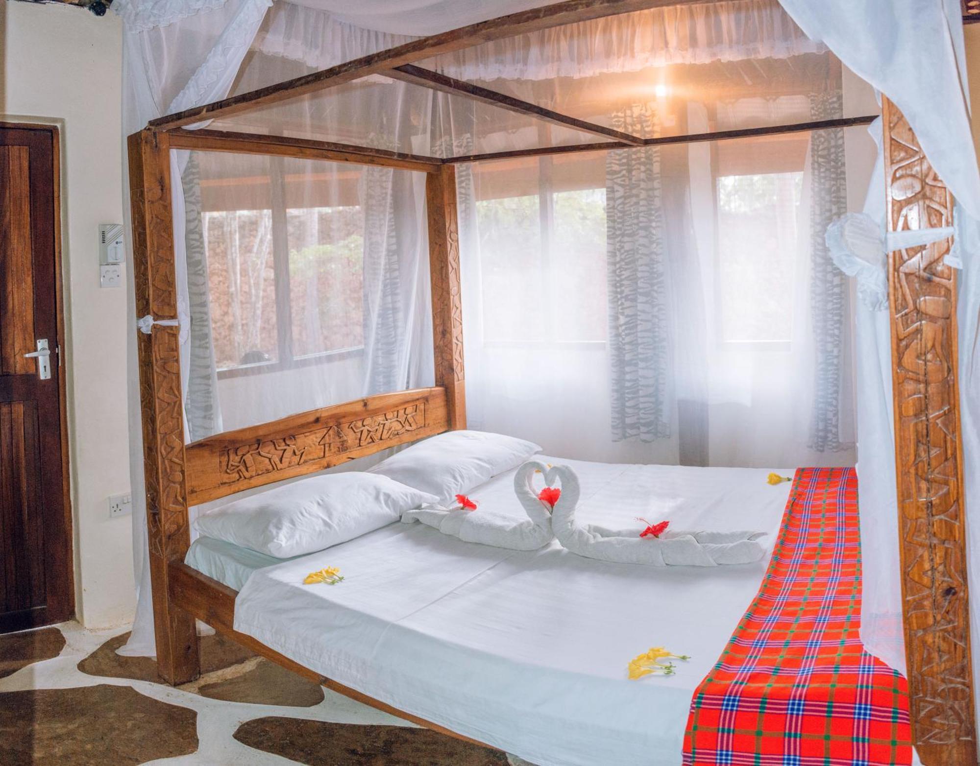 דיאני ביץ' Kijani Cottages In Diani מראה חיצוני תמונה